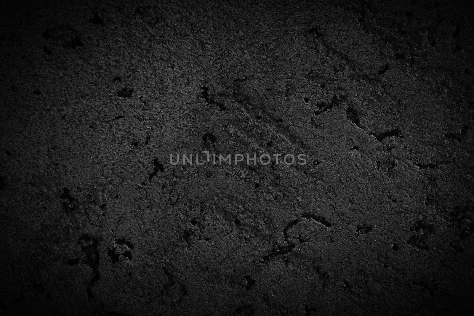 black concrete or cement material in abstract wall background texture.