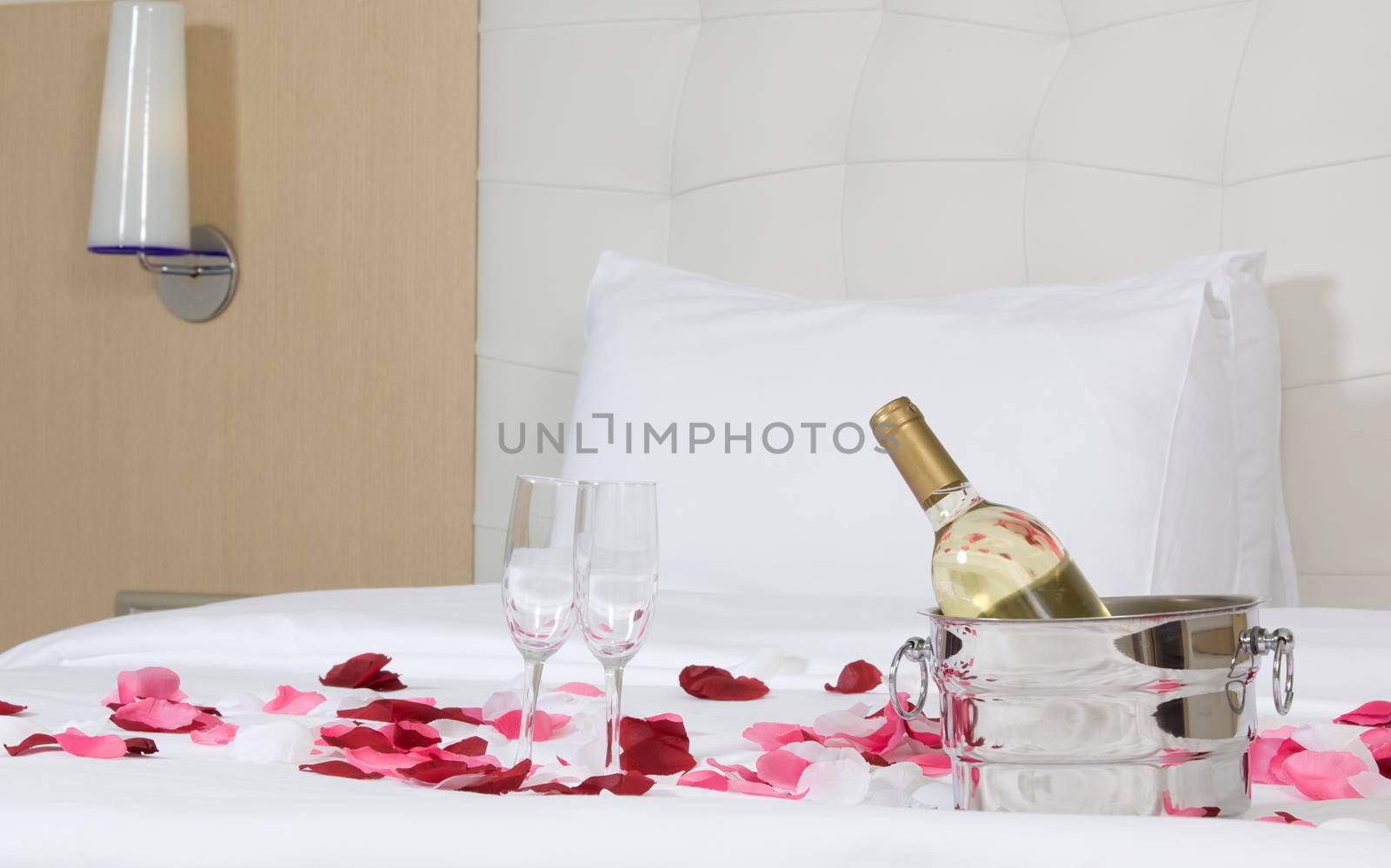 wine in bed to celebrate Valentine's Day at hotel room