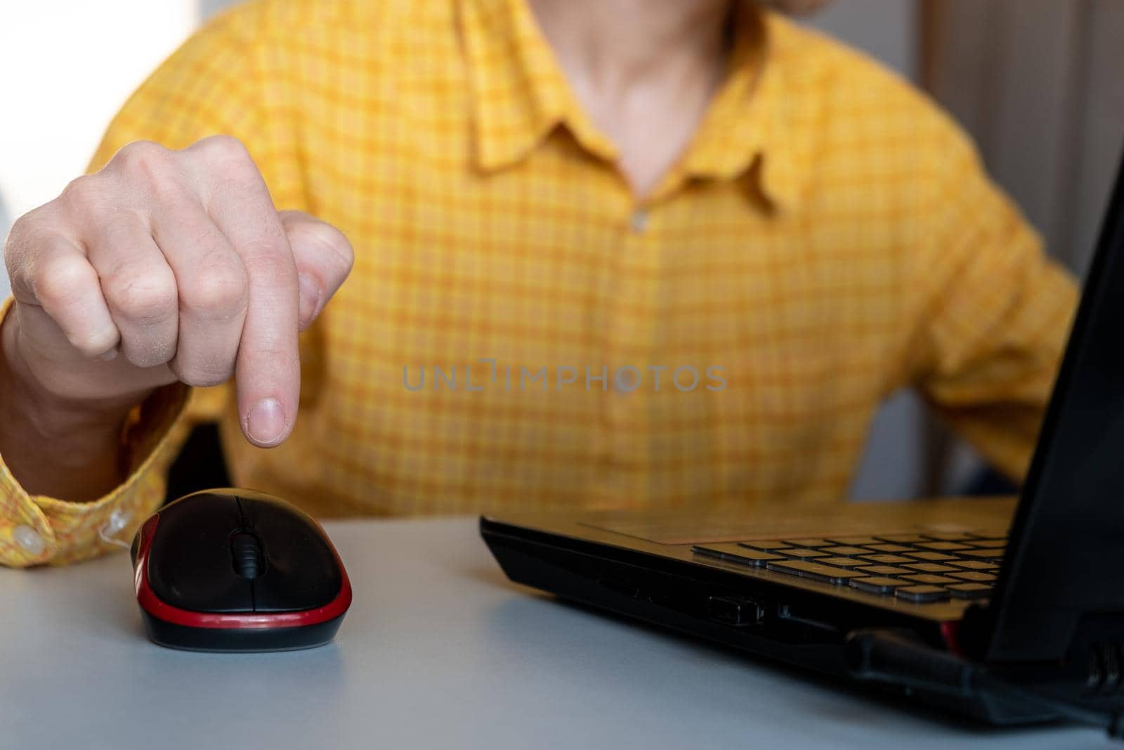 Man clicking on mouse. hand with computer mouse. Pressing button concept. Hit the button