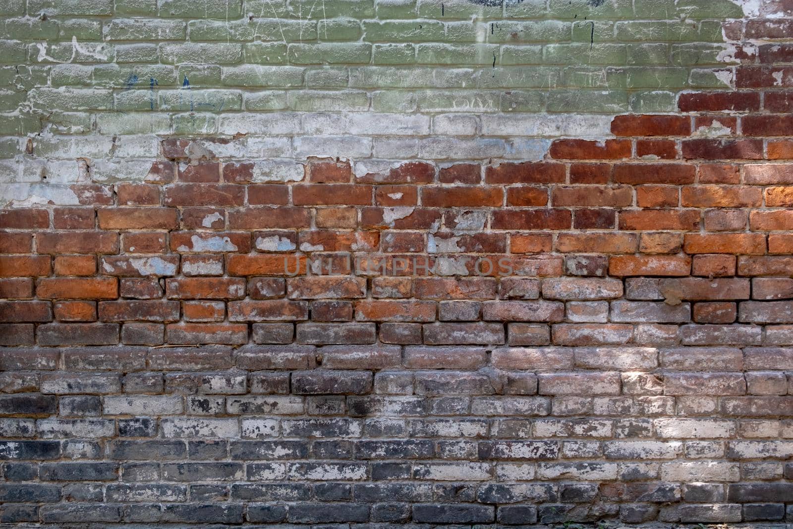 old brick wall background. green, red, gray colors brick wall texture background. wallpaper design