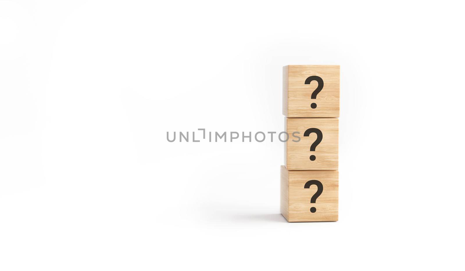 Wooden cube block shape with sign question mark symbol on white background. FAQ Answer, Q&A. 3D rendering.