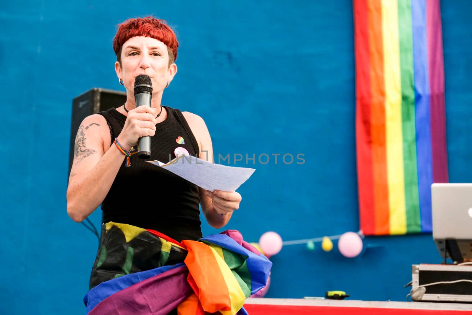 Lesbian Woman giving the proclamation speech at the Gay Pride Parade by soniabonet