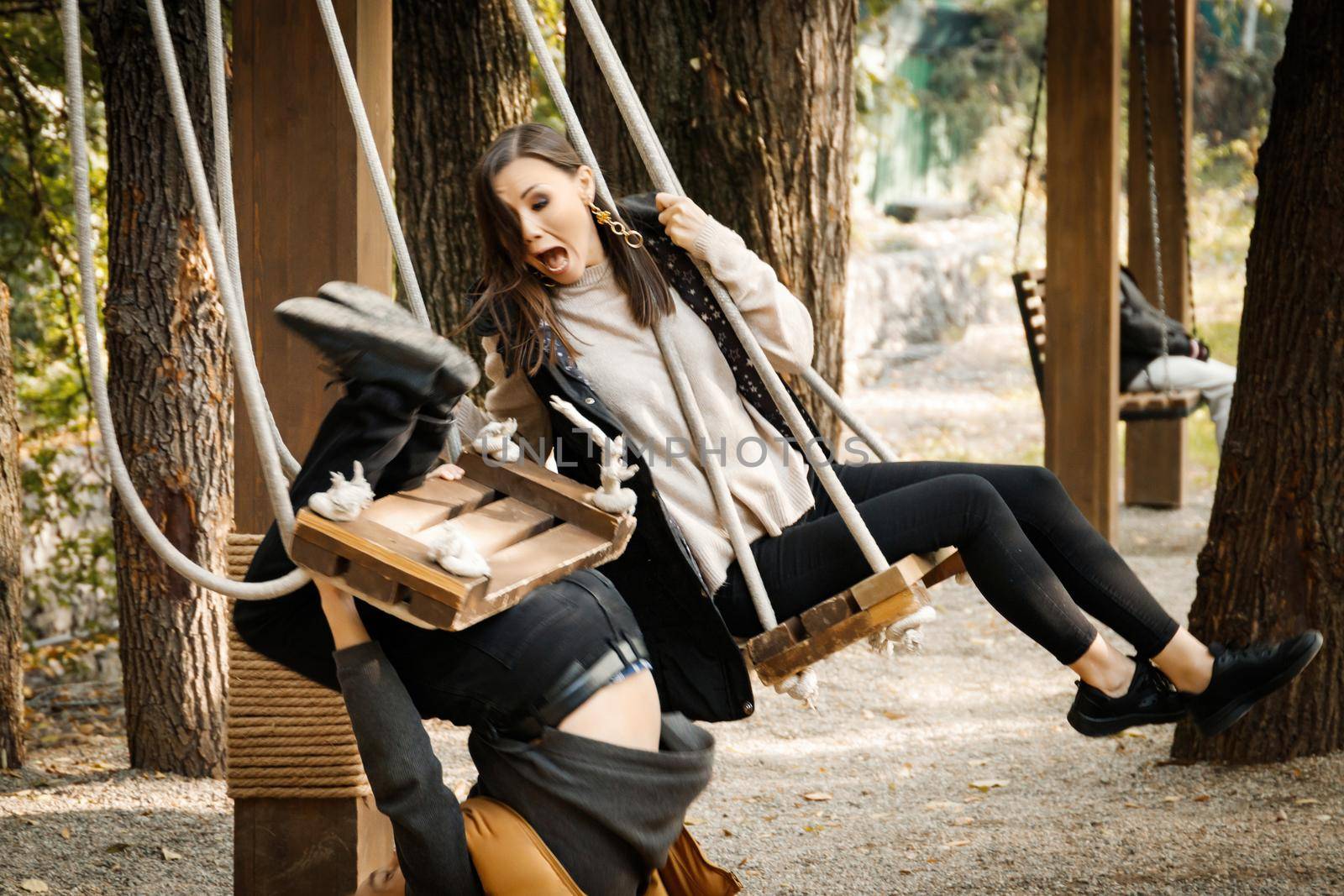 Bad Date. Man fell off the swing, Funny Disappointed Shocked Asian woman.