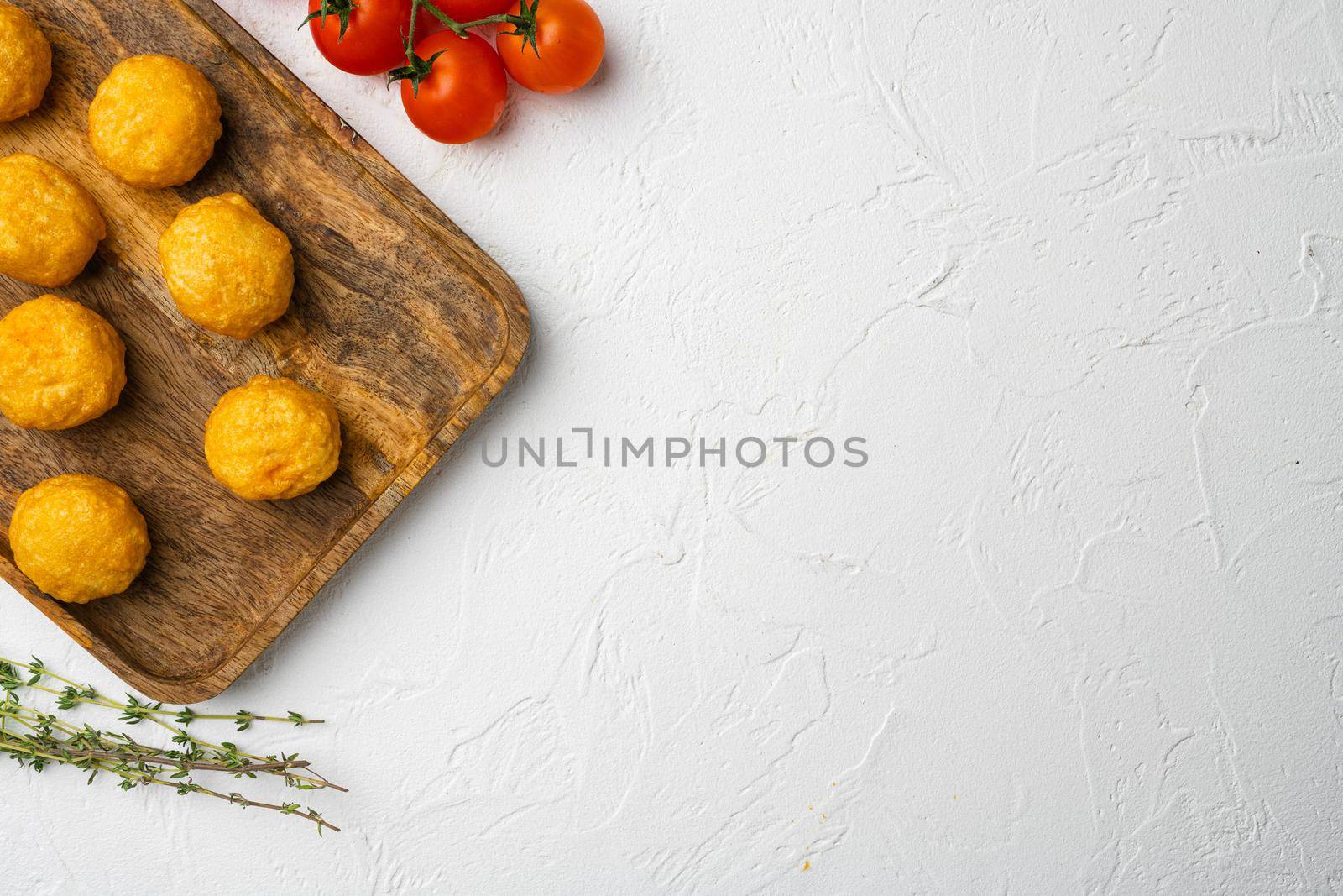 Breaded chicken fillet and batter, on white stone table background, top view flat lay, with copy space for text