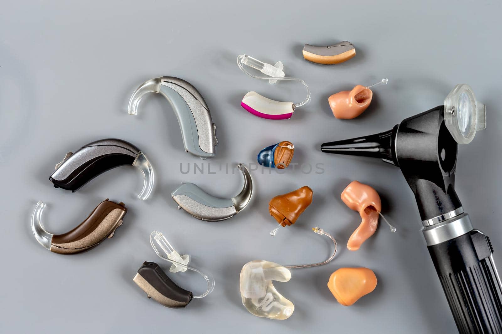 close-up view of a hearing aid and an autoscope