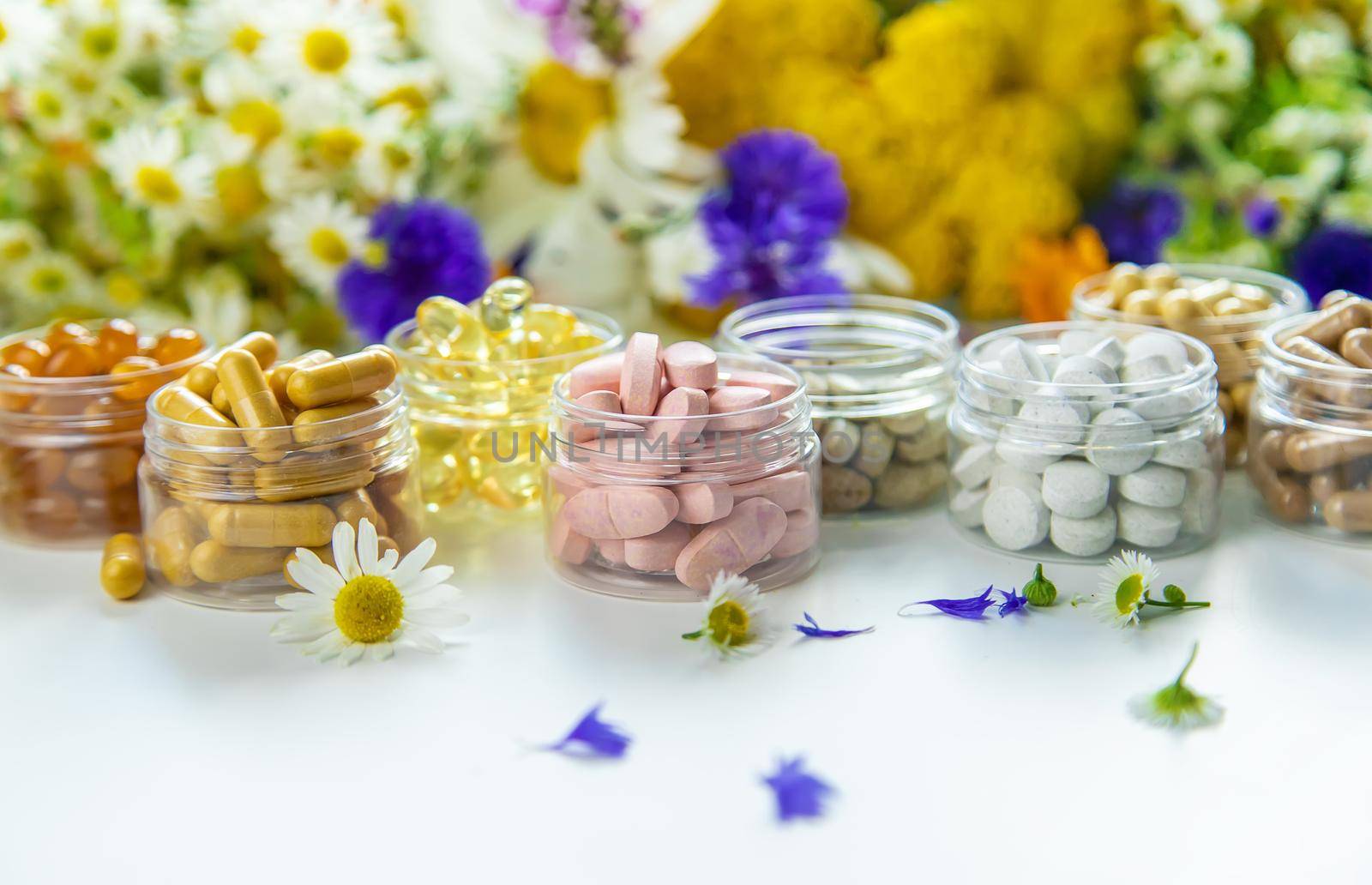 Homeopathy and dietary supplements from medicinal herbs. Selective focus. Nature.