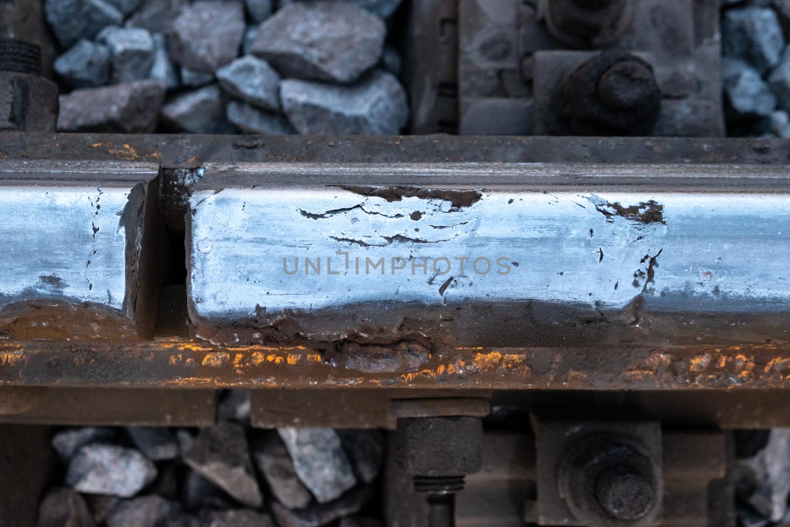 close up of rusty metal. closeup of damaged rail. railroad problems. railway issue. view from top. construction defect