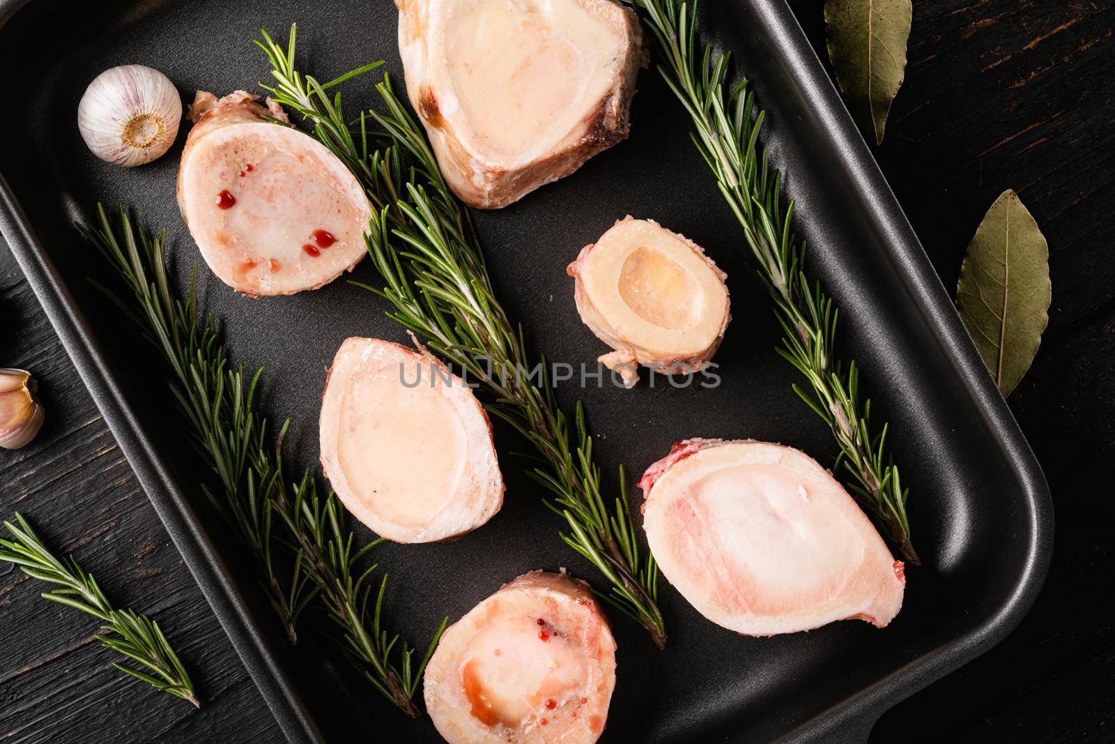 Beef Bones for Making Broth set, on black wooden table background