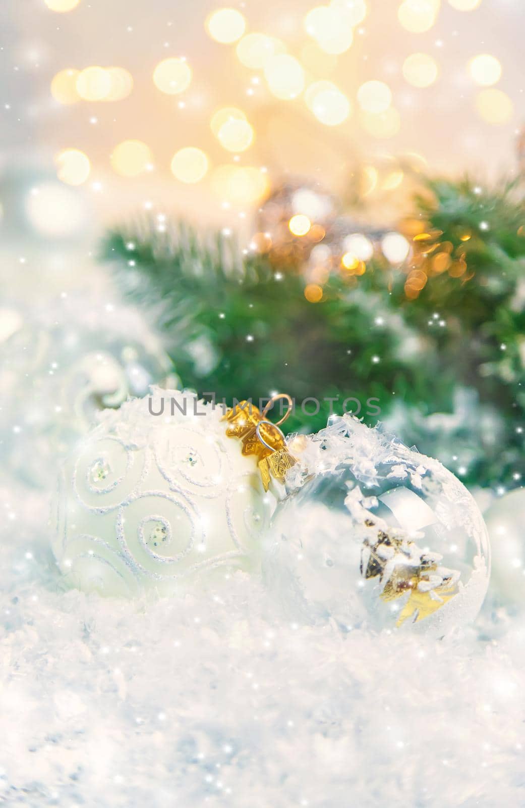 Christmas decor, pine cones in the snow. Selective focus. Holiday.