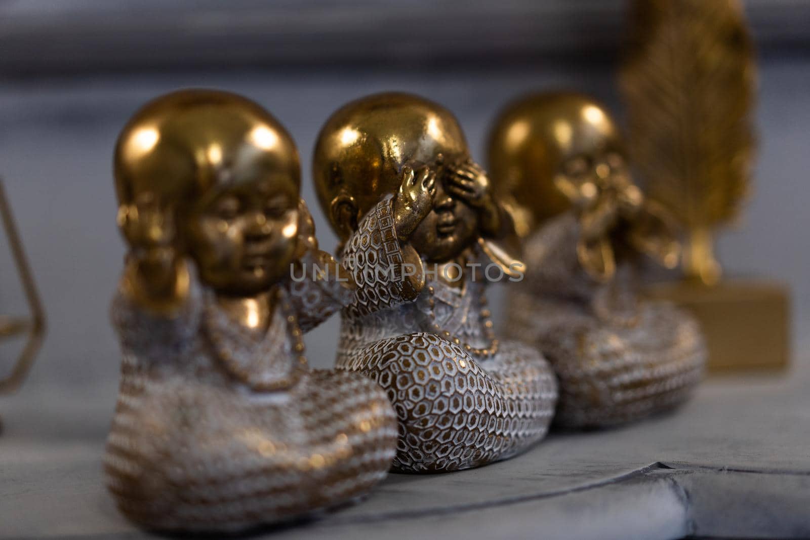 Three Wise little Buddha figurine in a row, Hear no evil, See no evil, Speak no evil, by andreonegin