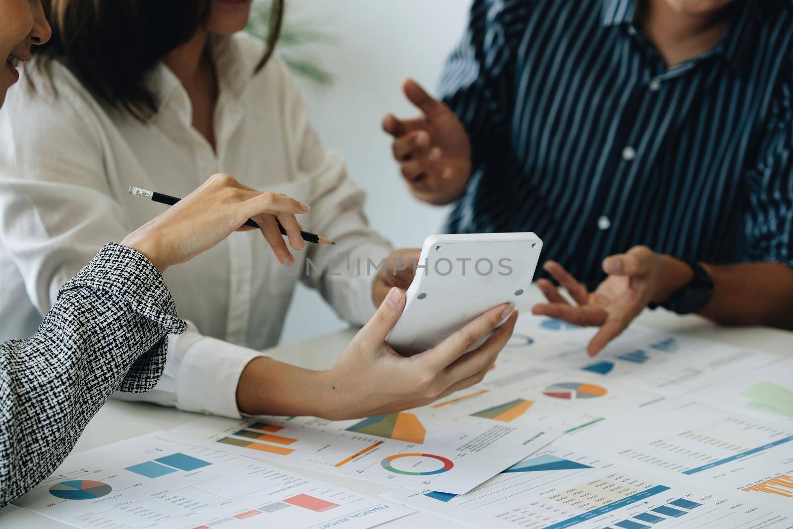 Analytics intelligence concept. Group of business people discuss current financial and economic on laptop for investment at the meeting