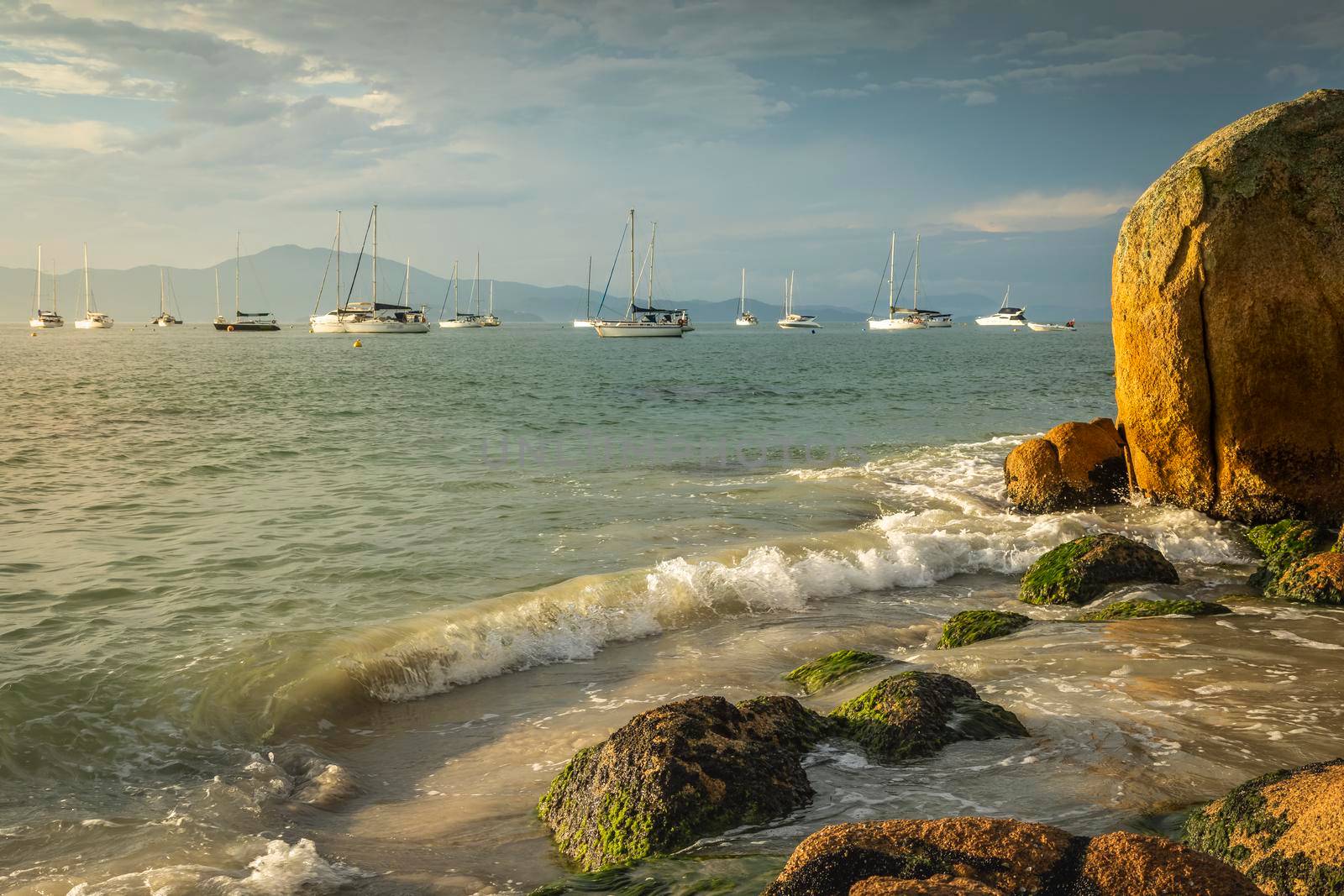 Bay with boats and sailboats in Jurere Internacional at sunset Florianopolis, Brazil
