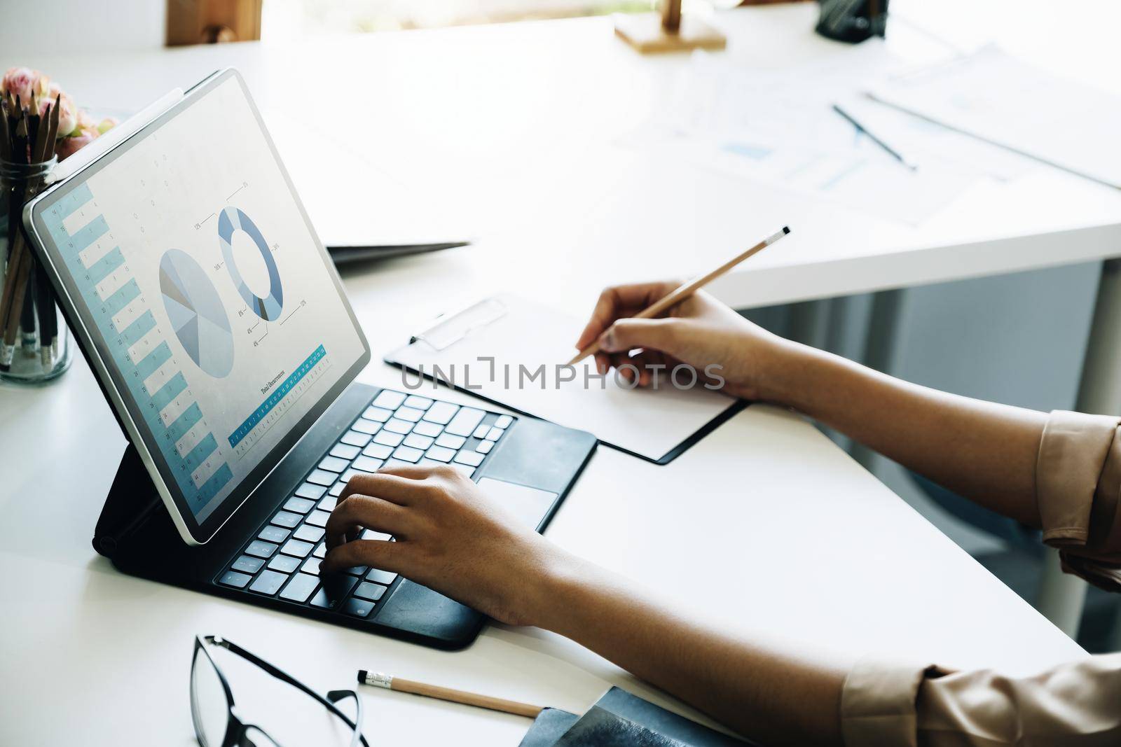 Budget, finance, woman marketer is using tablet computer for document analysis to manage investment planning risks for the company they work for.