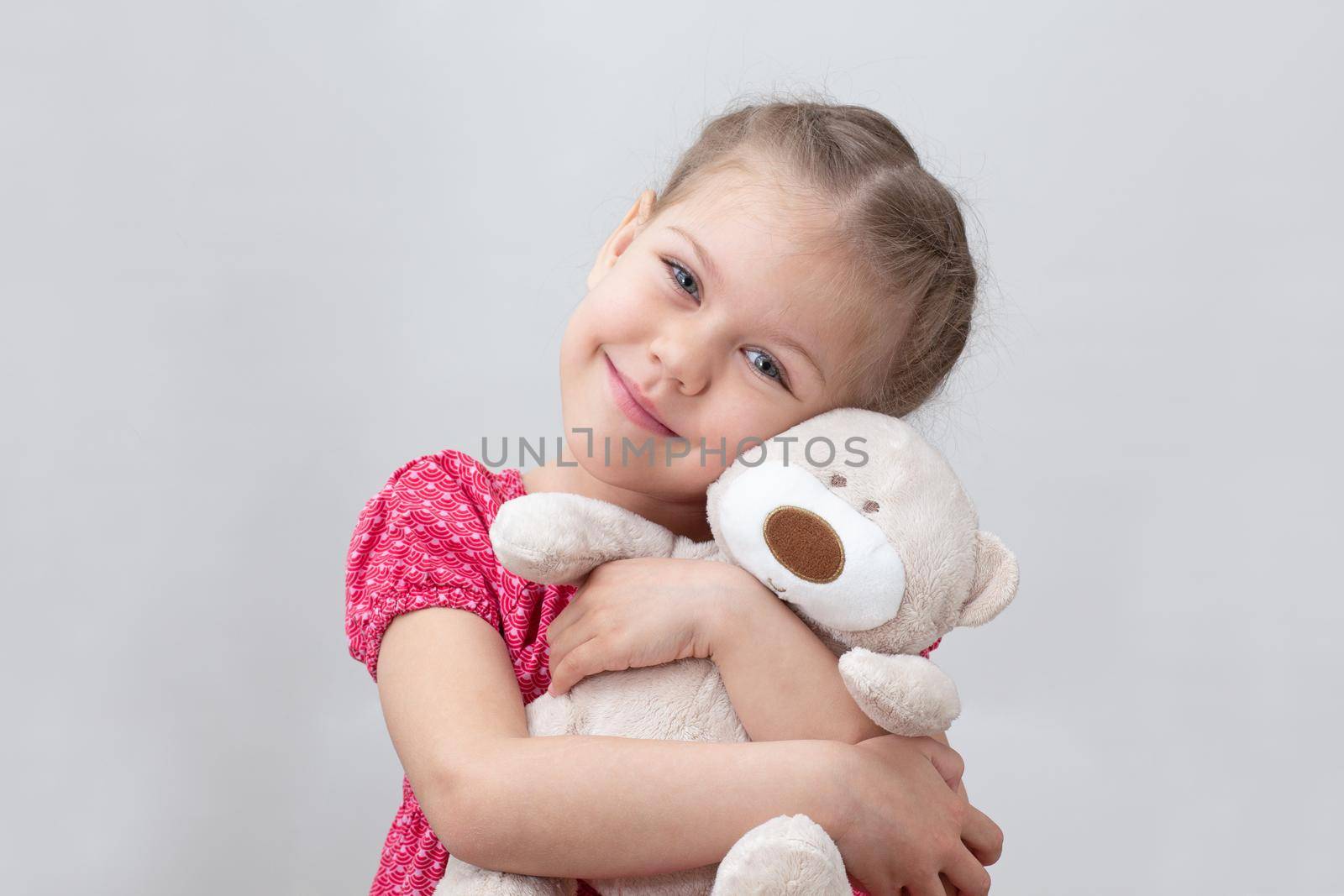 Happy child hugging teddy bear by TatianaFoxy