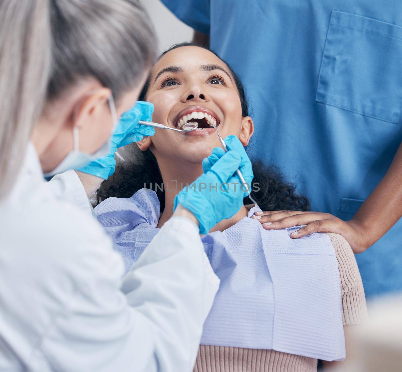 Shot of a young woman having a dental checkup.