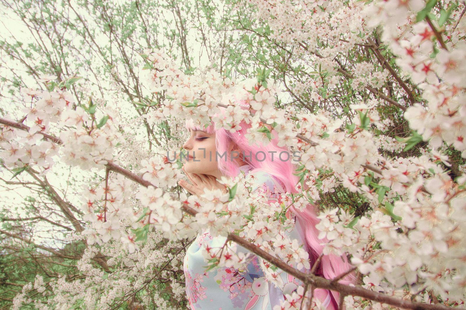 Portrait of young european woman wearing kimono. Asian beauty. Cherry blossoms. Hanami. Sightseeing of Japan concept by Hitachin