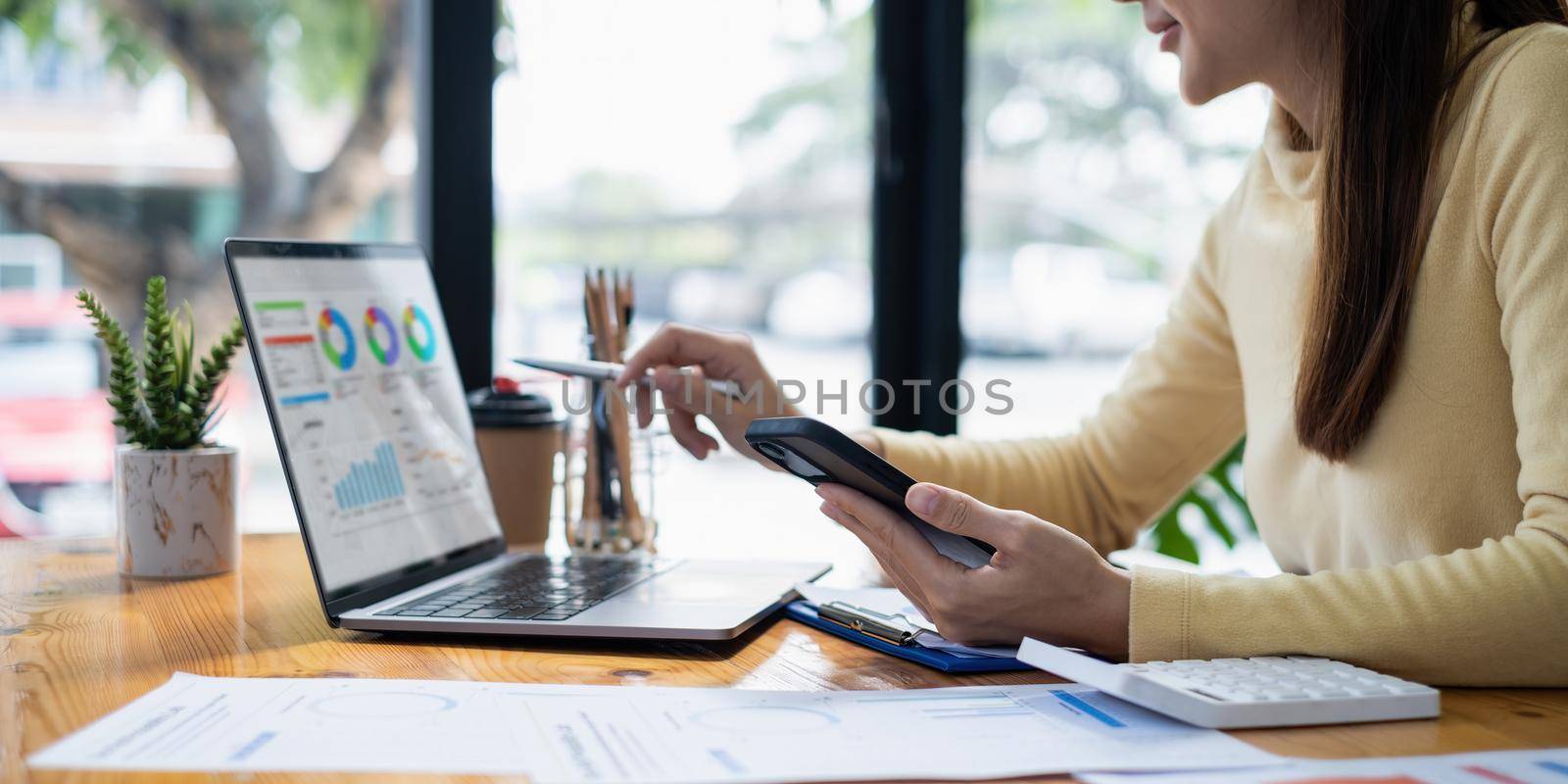 Image of Young woman working online on laptop computer. studying or working from home online concept