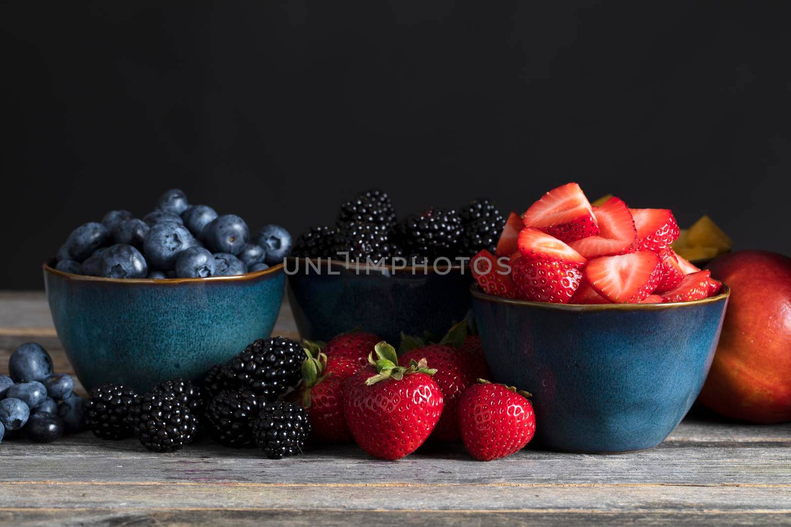 Bowls of Fresh Berries by charlotteLake