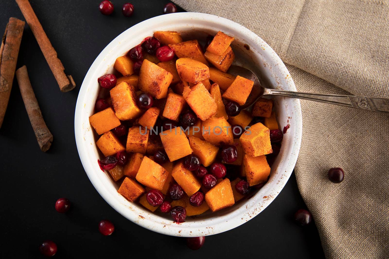 Baked butternut squash and cranberries with honey and cinnamon, just out of the oven.