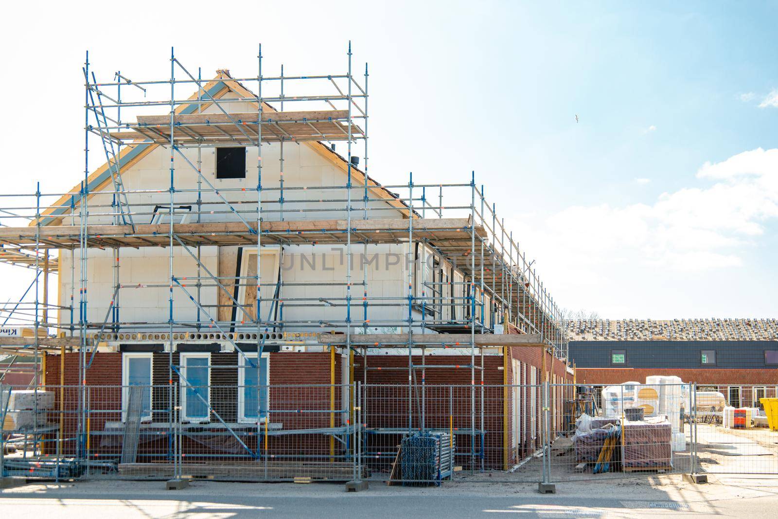 construction site of building new house, Dutch Suburban area with modern family houses by fokkebok