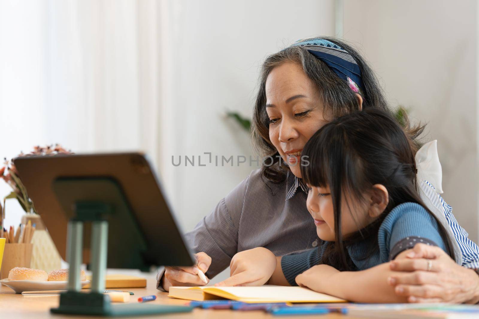 Happy moment of Daughter enjoying time together with mother at home. little child girl having fun