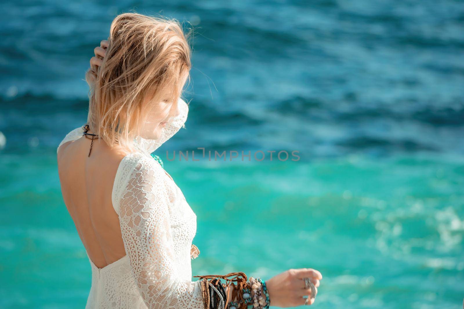 fashionable young model in boho style dress