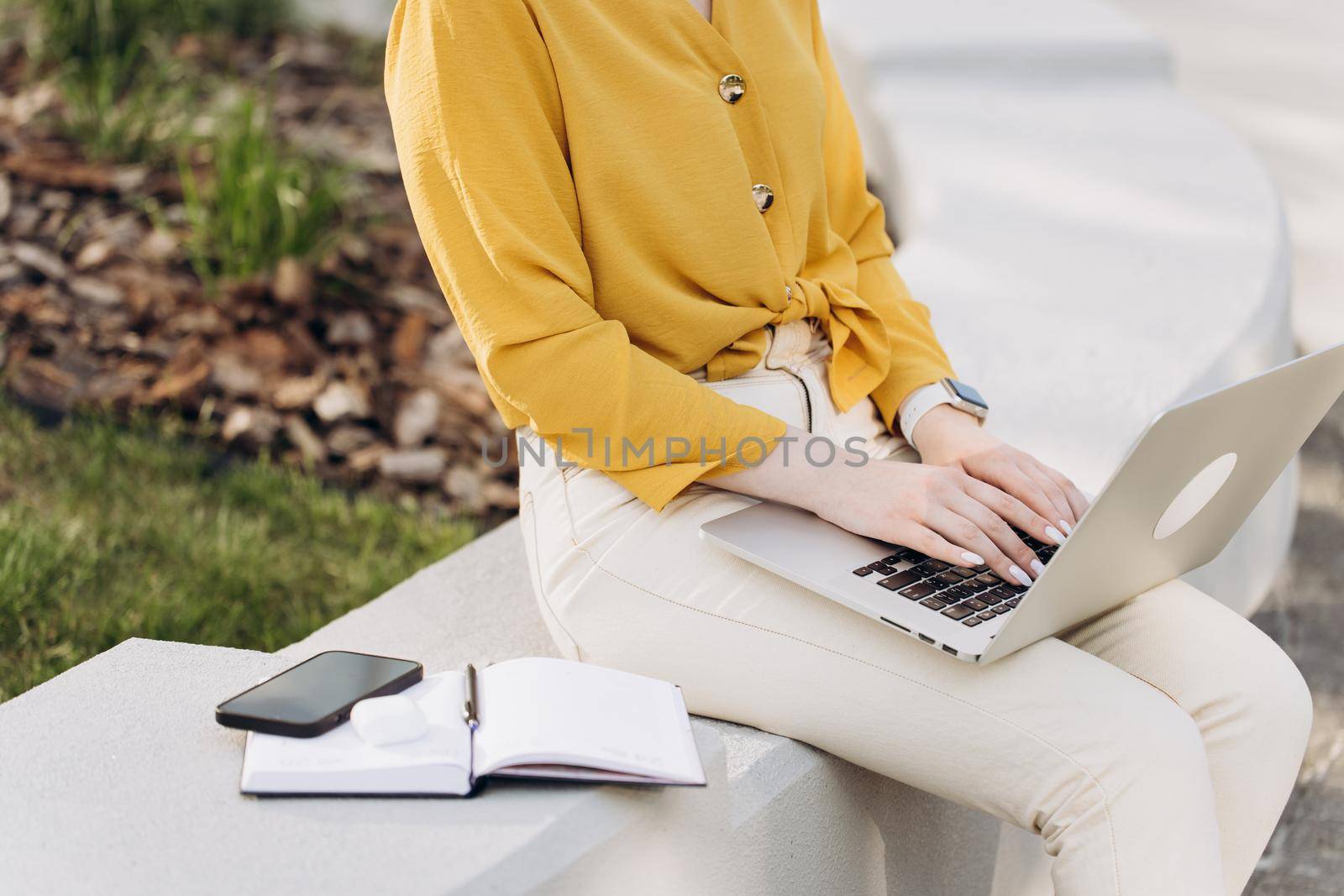 Female hands of business woman professional user worker using typing on laptop notebook keyboard sit at office outside working online with pc software apps technology concept by uflypro