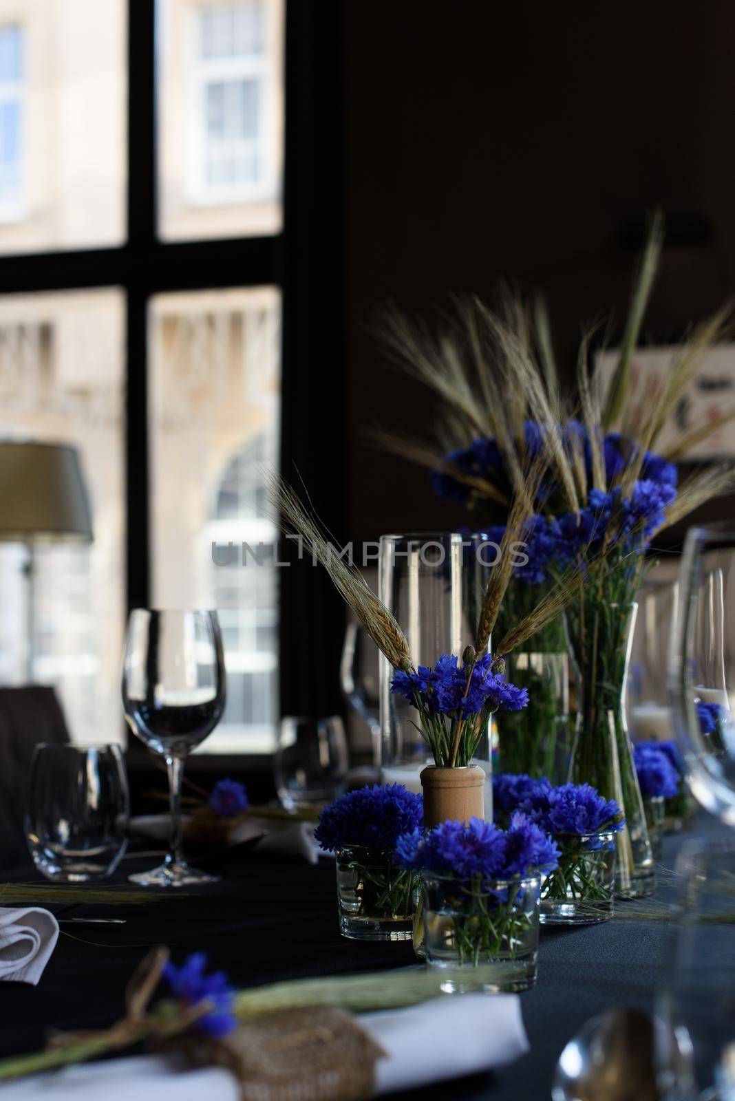 A set of furniture in a cafe. Vase with flowers decor for the restaurant.