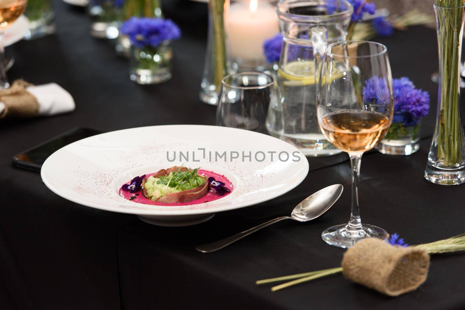 Served soup with pickled beets and tongue. Preparation of borscht. . Polish cuisine. Healthy food. Beet juice. Natural treatment.