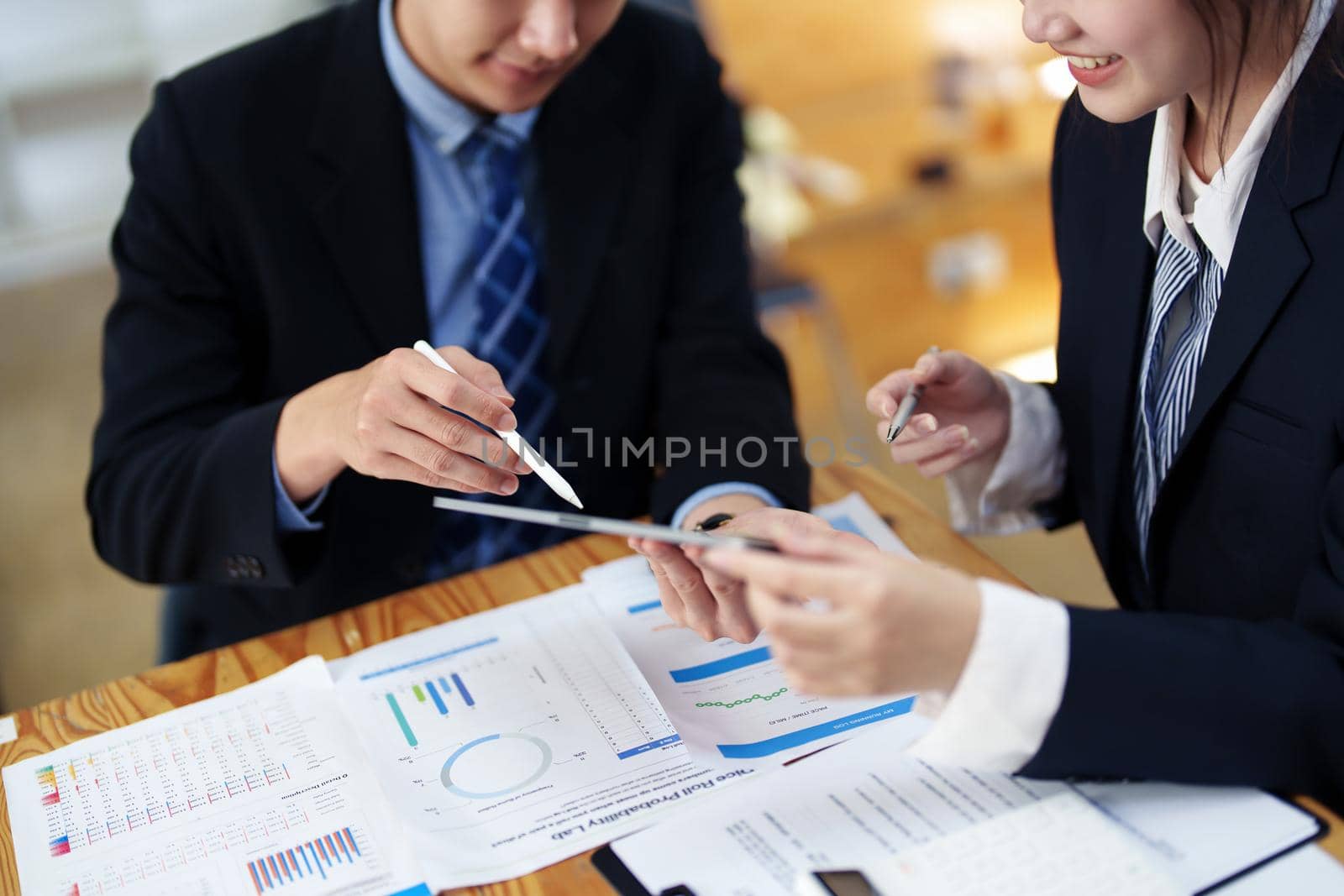 business people working together on a new project to analyze budgets and manage investment risks in today's profit boosting for marketing in the office room.