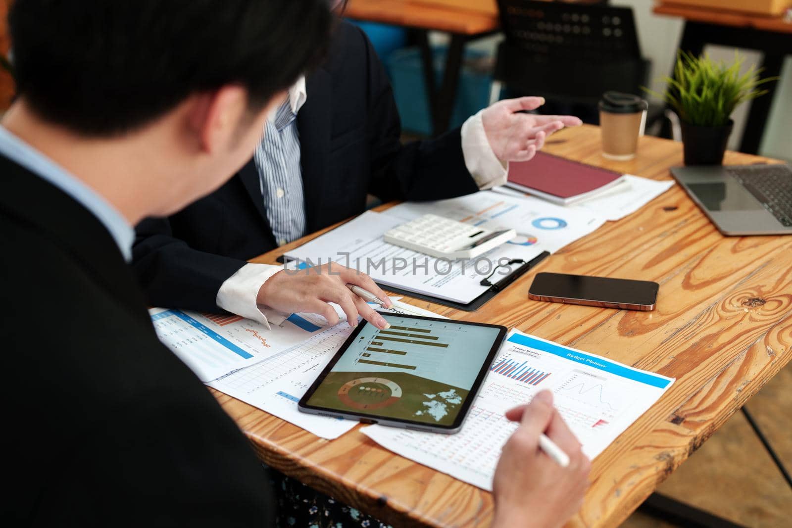 business people working together on a new project to analyze budgets and manage investment risks in today's profit boosting for marketing in the office room.