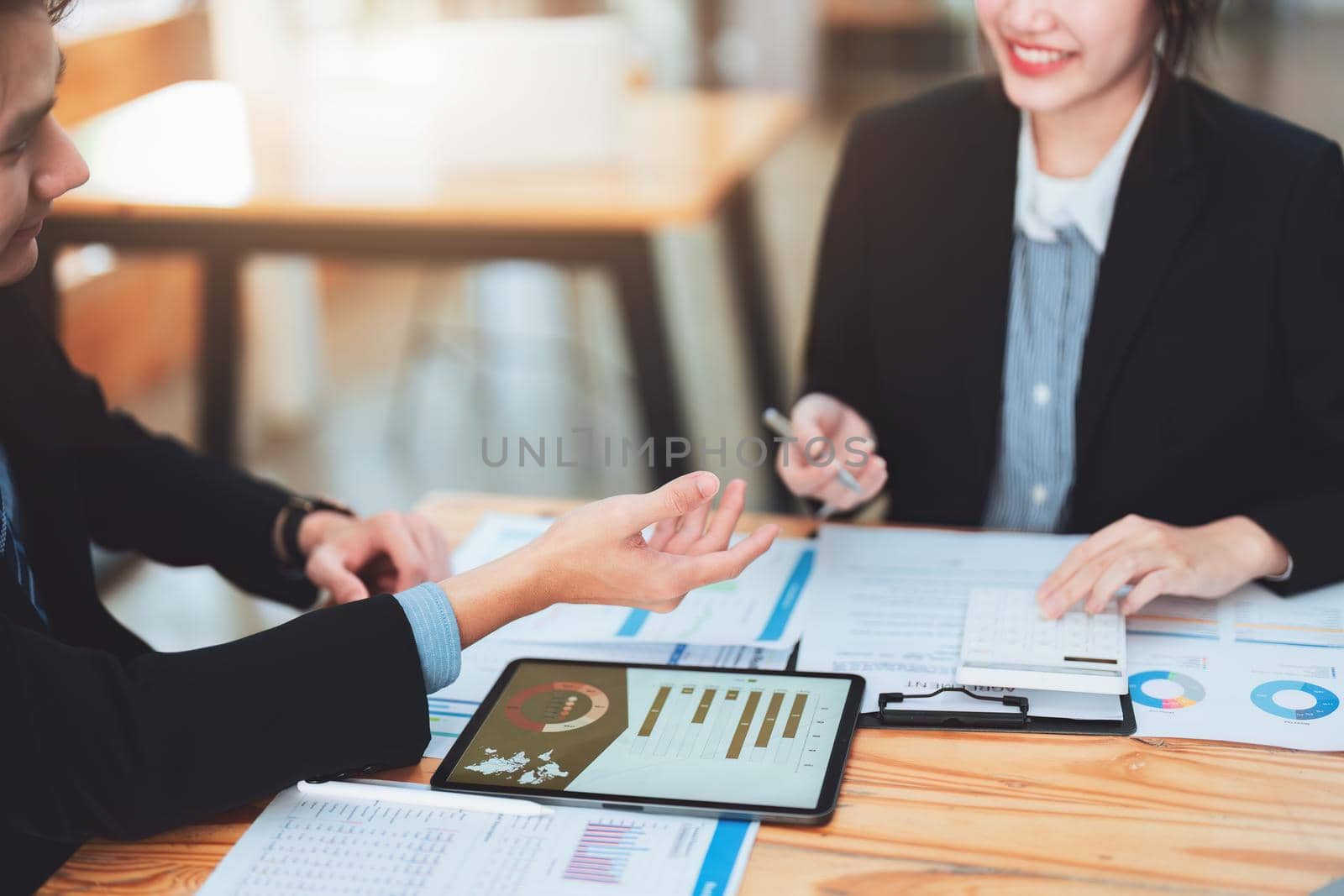 business people working together on a new project to analyze budgets and manage investment risks in today's profit boosting for marketing in the office room.