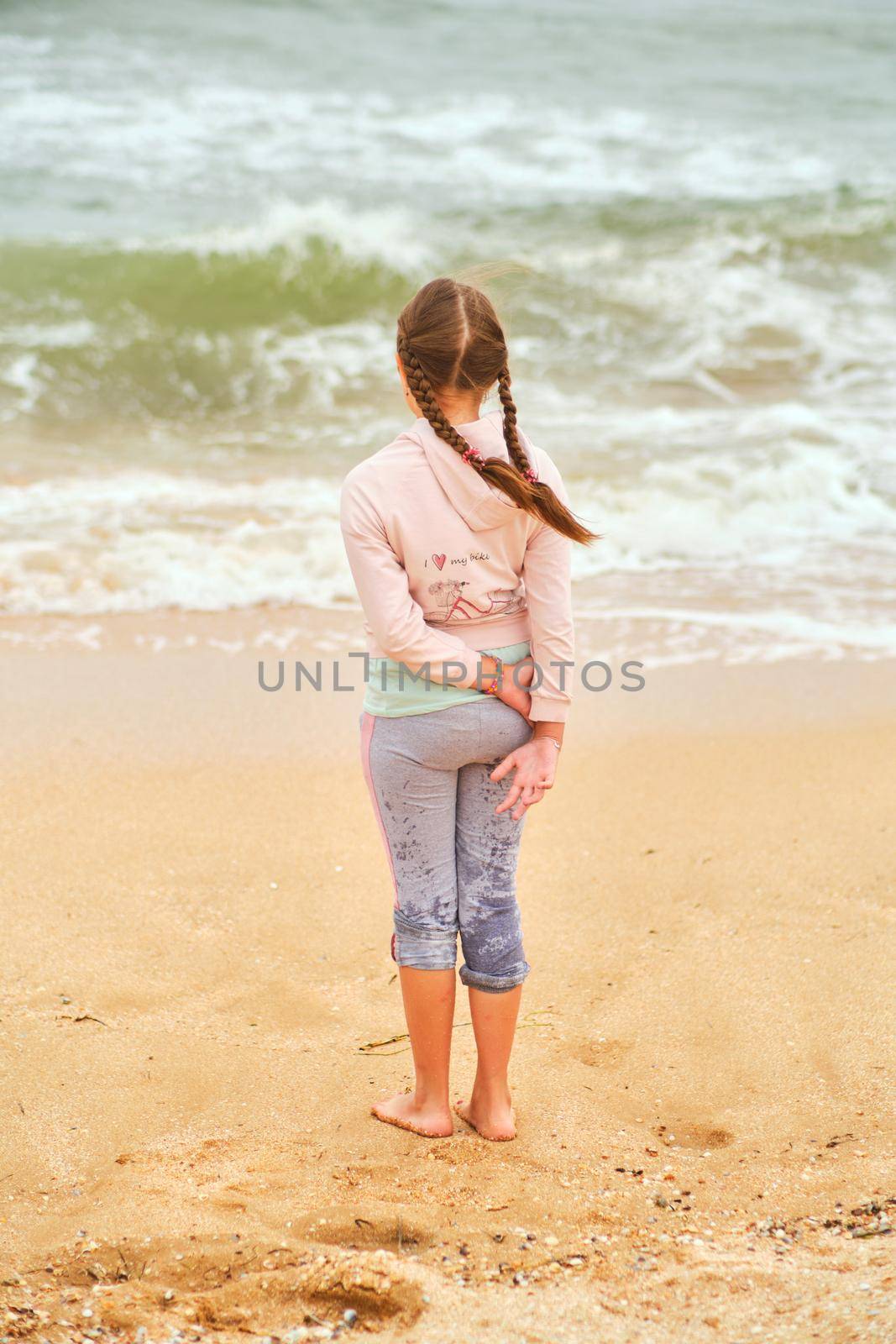Happy child looking at the sea. by InnaVlasova
