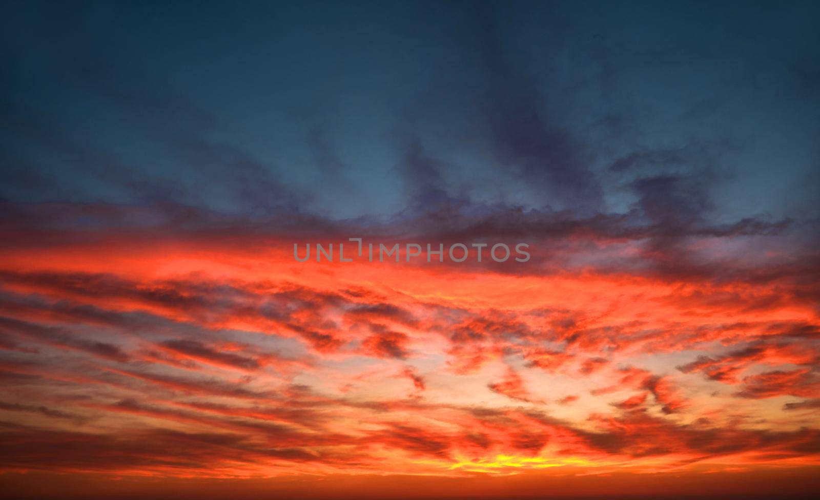 Sky sunset background concept. Skyline Evening sunset sky and the evening sunrise In the lake. Colorful with copy space.