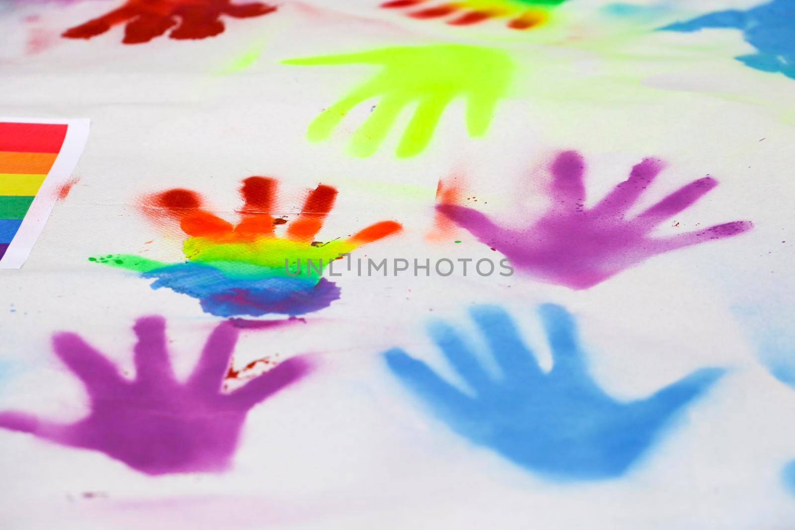 Santa Pola, Alicante, Spain- July 2, 2022: Colorful banners painted by children for the Gay Pride Parade in Santa Pola