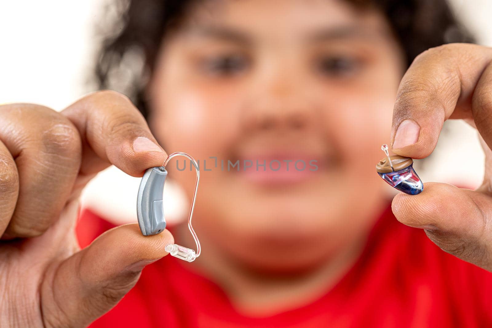 Close-up of a prosthesis being installed on a teenager.