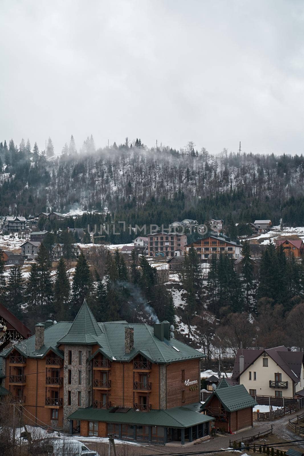 Ukrainian karpaty mountains winter landscape. Village among mountains. Polyanytsya, Ukraine - 04.01.2022