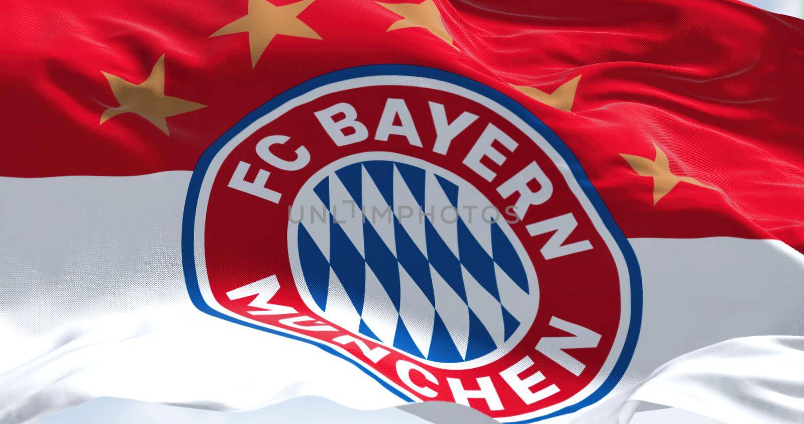 Munich, GER, June 2022: Fabric background with the Bayern Munich Flag waving. Bayern Munich is a German sports club based in Munich