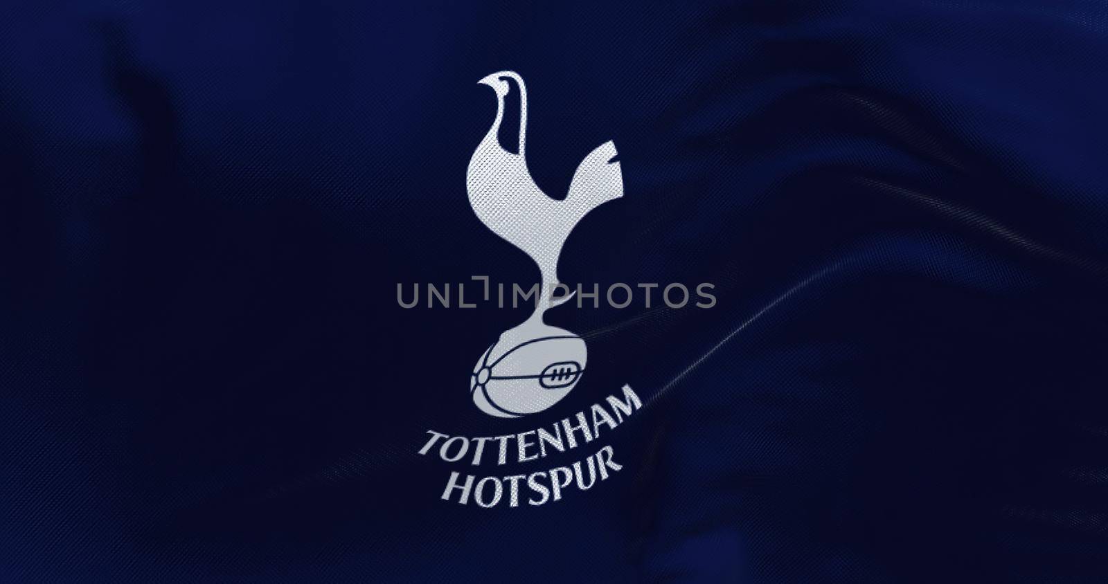 London, UK, May 2022: Fabric background with the Tottenham Hotspur Flag waving. Tottenham Hotspur is a professional football club based in Tottenham, London