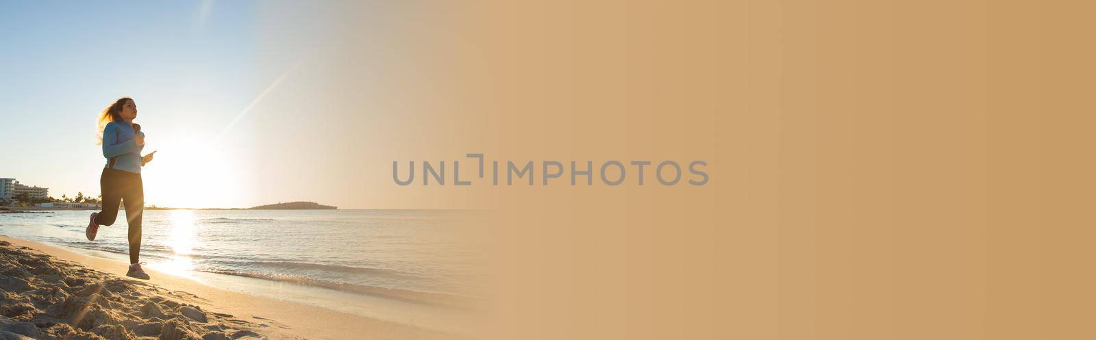 young healthy lifestyle fitness woman running at sunrise beach.