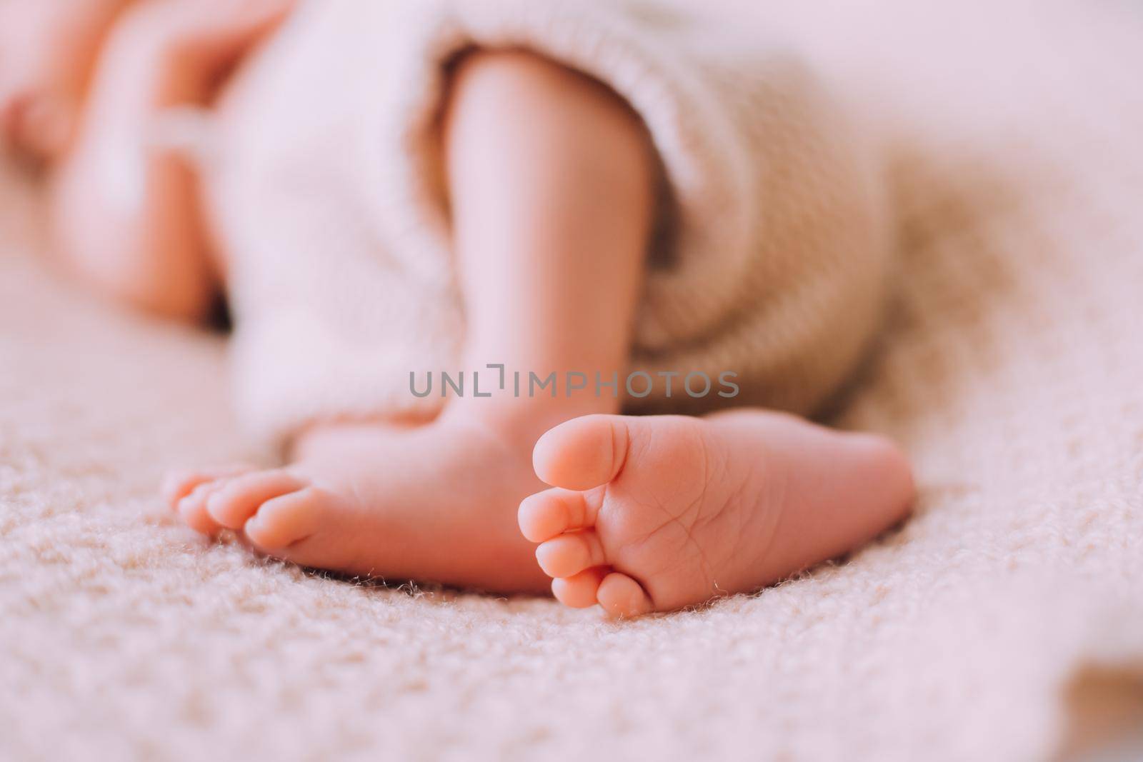Legs of a newborn baby lifestyle . A small child. An article about newborns. by alenka2194