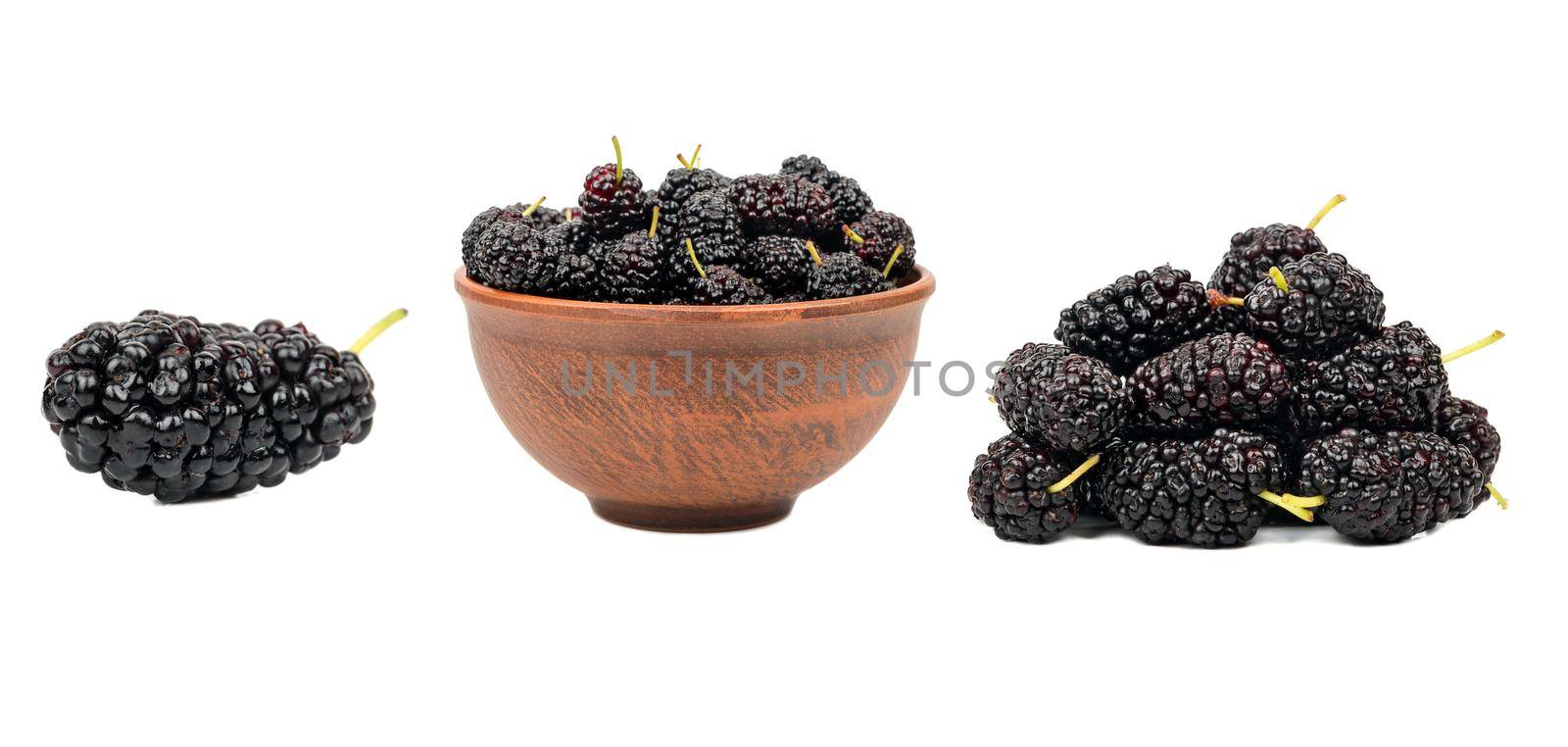 Ripe blackberry isolated on white background with clipping path. Fresh summer wild berries closeup. Detailed Blackberry collection with leaves.
