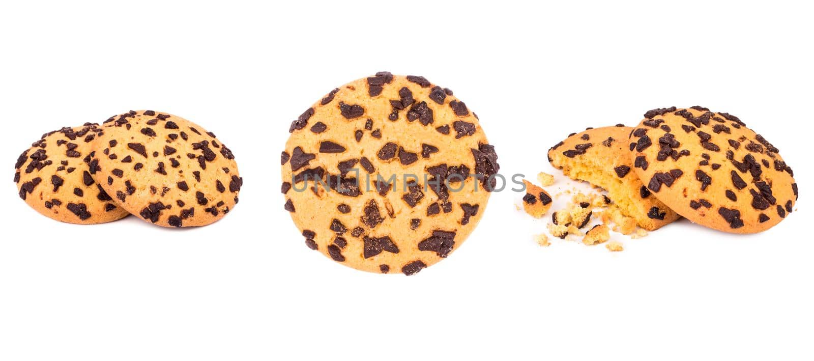 Isolated clipping path of die cut dark chocolate chip cookies piece stack and crumbs on white background of closeup tasty bakery organic homemade biscuit sweet dessert