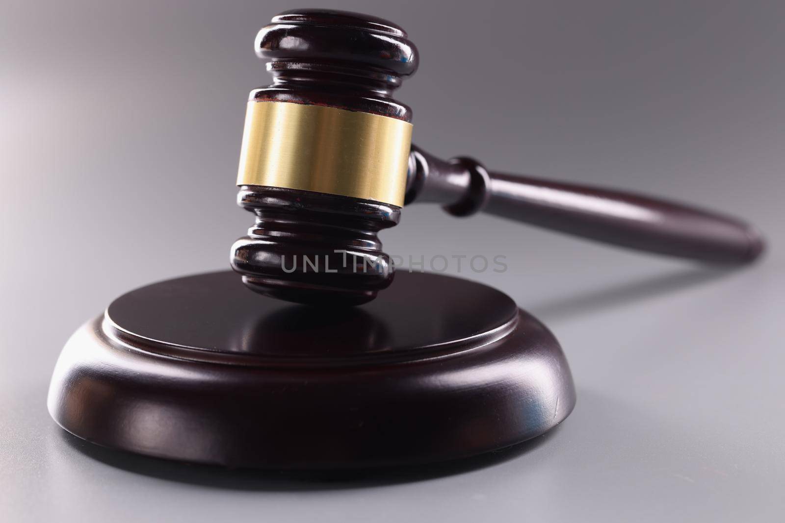 Judicial motolon on gray background. Judgment verdict or auction concept