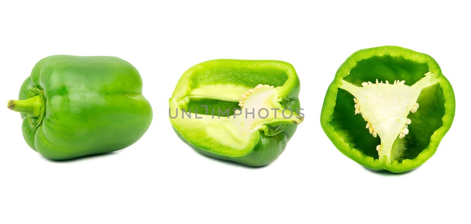 Set of fresh whole and sliced sweet green pepper isolated on white background.