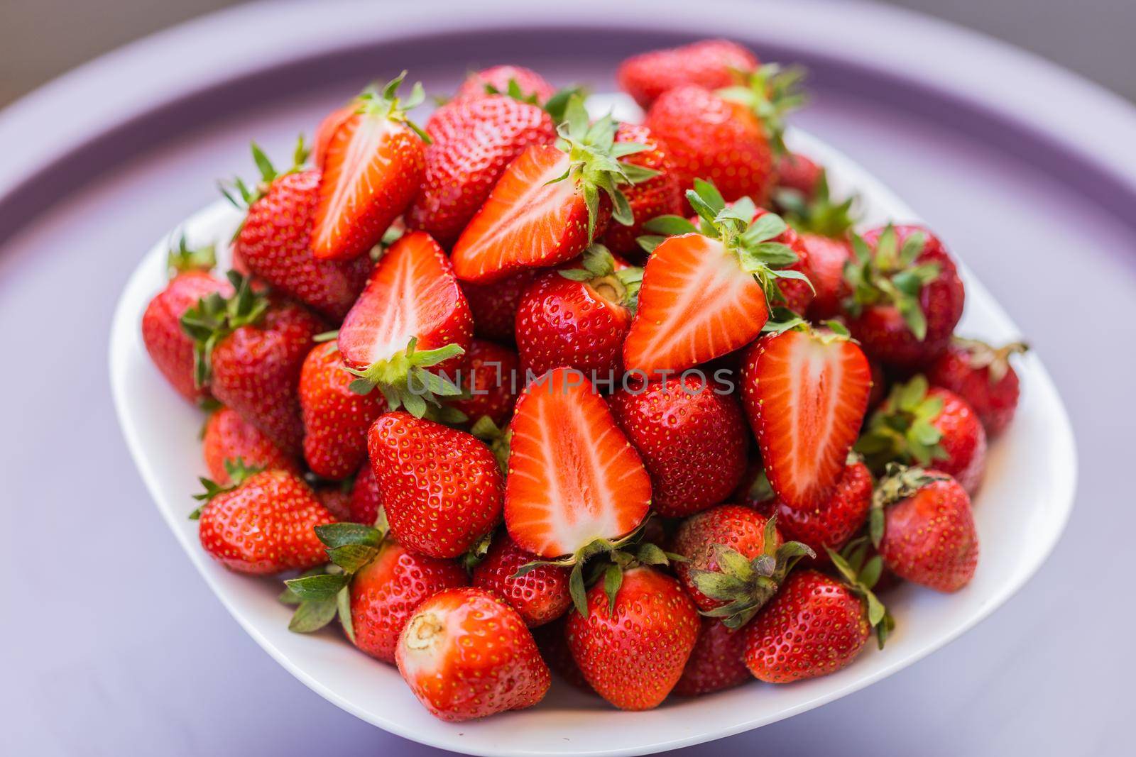 Fresh ripe delicious strawberries in bowl - healthy food and vegetarian by Satura86