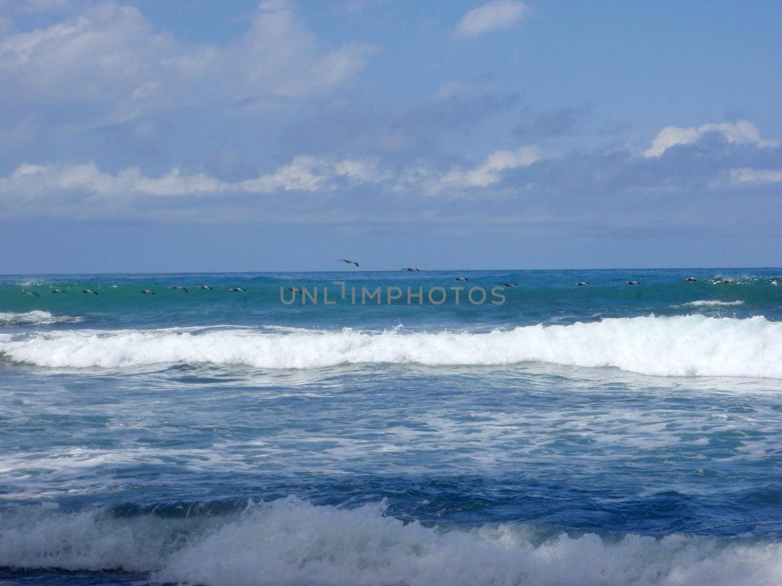 Flying in Formation by some nice waves, in Punta Banco, Costa Rica