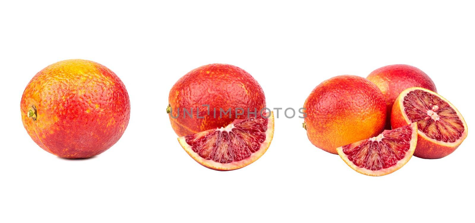 Set of fresh whole, half and sliced red blood orange fruit isolated on white background