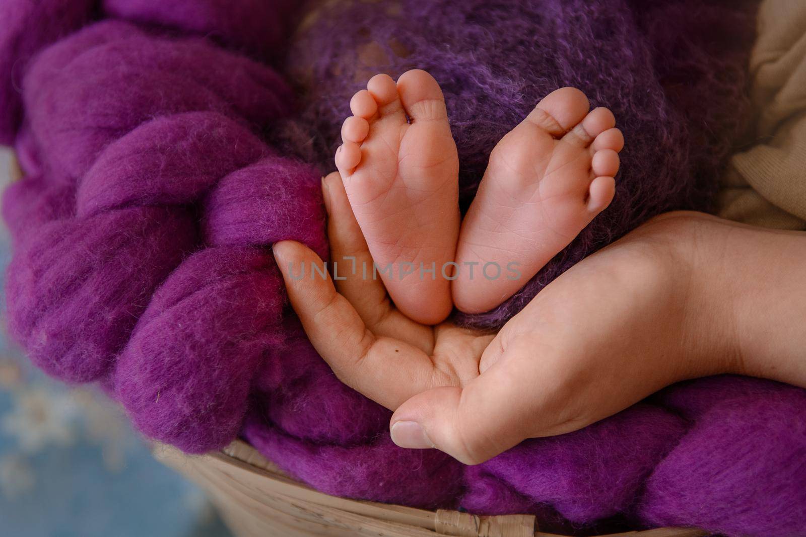 newborn baby feet and hands of parents by Kai_Grim