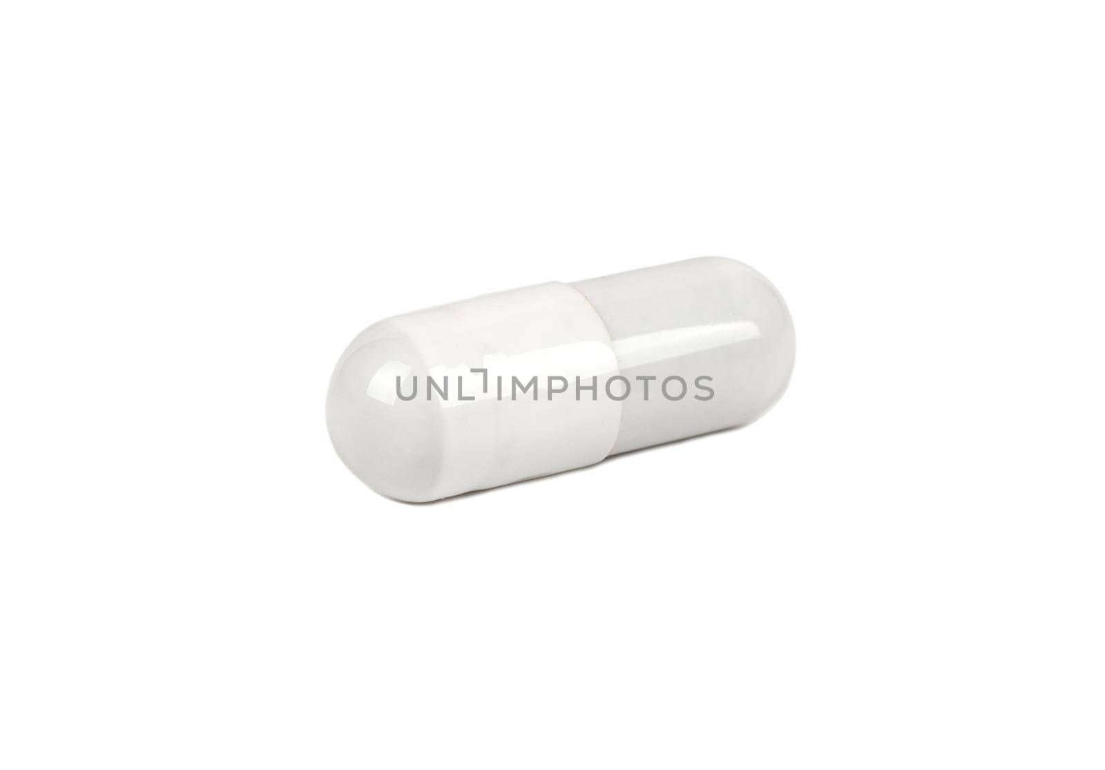 Grey capsule isolated on a white background